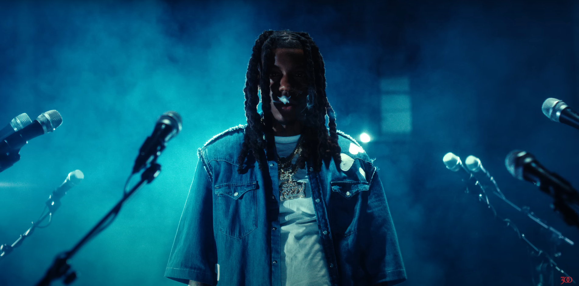 Load video: omb peezy wearing myke sims collection garments in music video